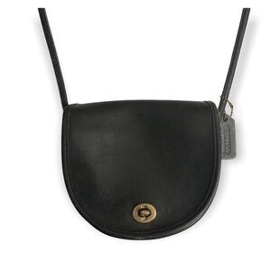 Coach vintage black leather saddle bag